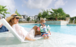 Woman lounging at Pool